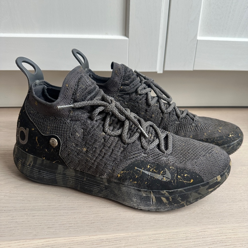 Nike Black Knit KD 11 Sneakers with Gold Splatter Accents